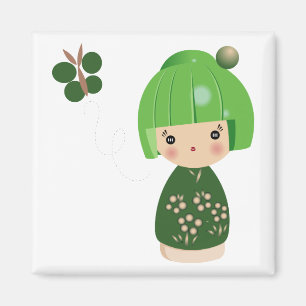 Aimant vert de triplet de Kokeshi