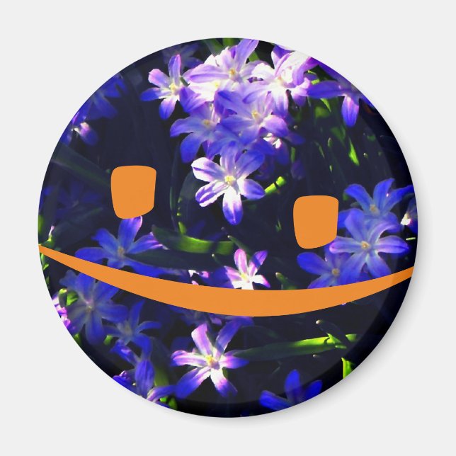 Aimant Visage souriant jaune sur les fleurs bleues (Devant)