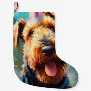 Airedale-Hund mit Geburtstagshut und Luftballons Kleiner Weihnachtsstrumpf