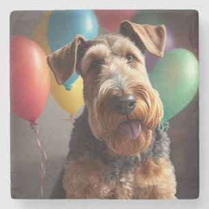 Airedale-Hund mit Kuchen und Luftballons Steinuntersetzer