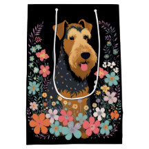 Airedale Terrier Dog im Blumengarten Niedlich