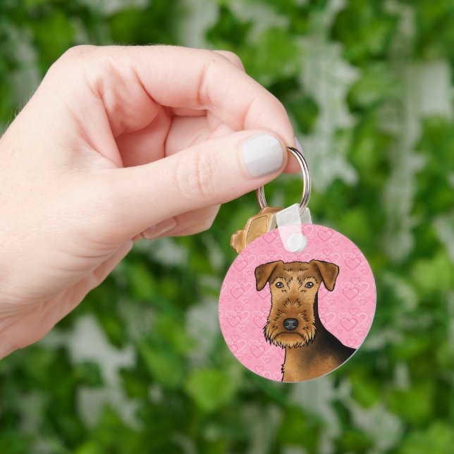 Airedale Terrier Niedlicher Hund Kopf auf rosa Her Schlüsselanhänger (Hand)