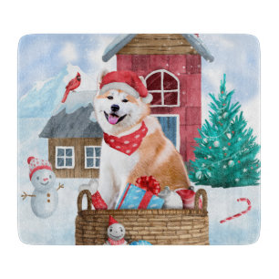 Akita-Hund im Schnee Weihnachtshundehaus Schneidebrett