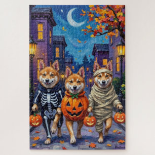 Akita-Hunde beim Trick-or-Treat in Halloween-Kostü