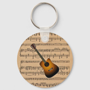 Akustikgitarre mit Notenen-Hintergrund Schlüsselanhänger