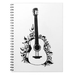 Akustische Gitarre auf einem Hintergrund von Blume Notizblock