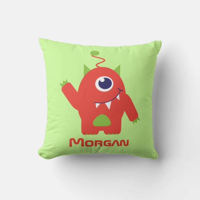 Alien aux yeux orange et vert nom enfant coussin (Recto)