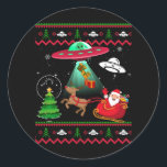 Alien Santa UFO Entführung Ugly Christmas Sweater  Runder Aufkleber<br><div class="desc">phantastischer Abschlag für extraterrestrische Gläubige, ufo und Alien Liebhaber. Niemand weiß es, außer dem Verlierer, der im UFO ist. Alien tee Funny tee zeigt ein Raumschiff, das eine Raumentführung eines Menschen darstellend. Verschwörung - oder nicht? Dieses lustige Abschlag ist großartig für jeden, dass Lieben Alien Außerirdischen Mars Weltraum Sonne Sonnensysteme...</div>