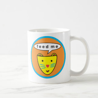"Alimentez-moi" la tasse de logo de chat