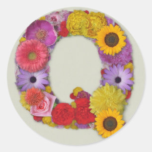 Alphabet Q in Blume Runder Aufkleber