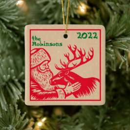 Alt modischer Woodcut Weihnachtsmann und Rentier Keramikornament