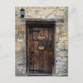 Alte Holztür mit Licht Postkarte