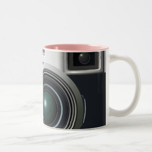 Alte schwarze Kamera Zweifarbige Tasse