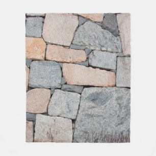 Alte Steinmauer der alten Burg. abstrakt, antike Fleecedecke