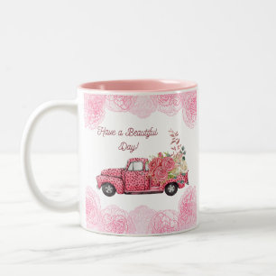 Alte Vintage-Rosa-Pickup mit Blumen Zweifarbige Tasse