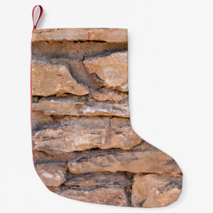 Alte Ziegelmauer. Grunge-Ziegelwand-Hintergrund. B Kleiner Weihnachtsstrumpf