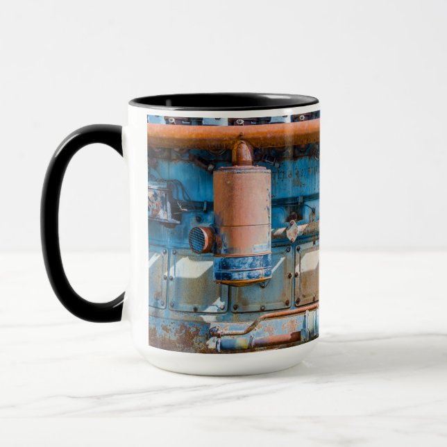 Alter und rostiger Atlas Imperial Diesel Motor in  Tasse (Links)