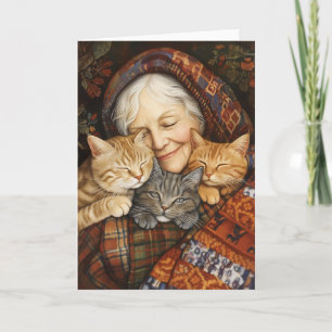 Ältere Frauen nehmen drei Katzen gemütlich ein Einladung