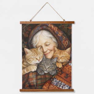 Ältere Frauen nehmen drei Katzen gemütlich ein Wandteppich Mit Holzrahmen