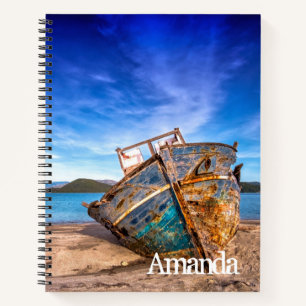 Altes blaues Boot am Meer Notizbuch