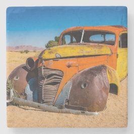 Altes und verlassenes Auto in Solitaire, Namibia Steinuntersetzer