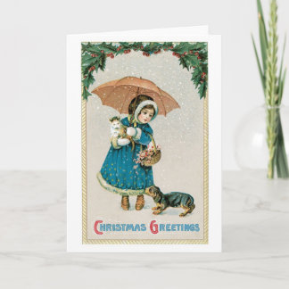 Altmodisches Weihnachten, Mädchen mit Katze und Feiertagskarte