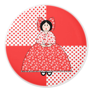 Amelia-Puppe mit rotem Polka-Dot-Hintergrund Keramikknauf