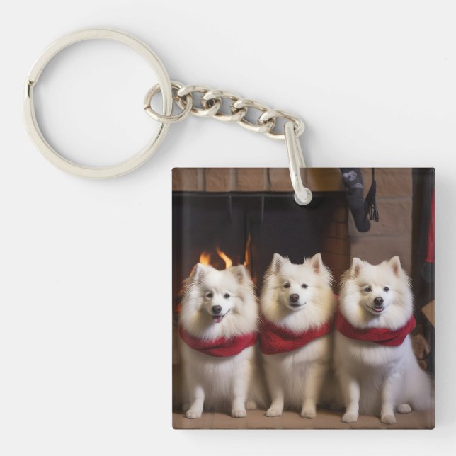 American Eskimo am Feuerplatz Weihnachten Schlüsselanhänger (Vorderseite)