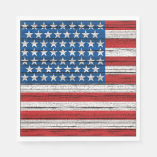Amerikanische Flagge auf gewittertem Holzplanmuste Serviette