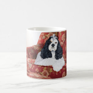 Amerikanischer Cocker Spaniel im roten Sessel Kaffeetasse