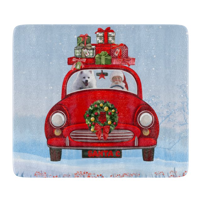 Amerikanischer Eskimo Hund in Auto mit dem Weihnac Schneidebrett (Vorderseite)