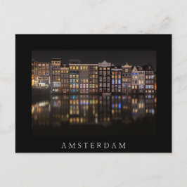 Amsterdam-Häuser mit bunten Lichtern in der Nacht Postkarte
