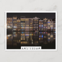 Amsterdam-Häuser mit bunten Lichtern in der Nacht