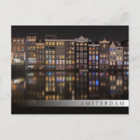 Amsterdam-Häuser mit bunten Lichtern in der Nacht