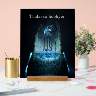 An acrylic sign of "The Prayer Ruins and Guardians Acrylschild