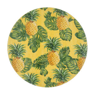 Ananas und tropische Blätter auf Gold Schneidebrett