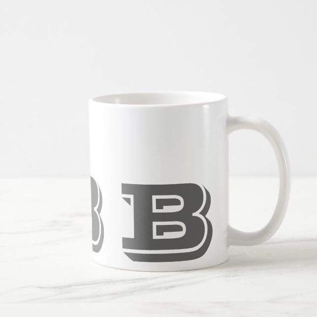 Anfangsb graue moderne Kaffee-Tasse des Monogramm- Kaffeetasse (Rechts)