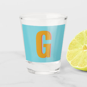 Anfangsbuchstaben Aqua und Mustard Retro Typografi Schnapsglas