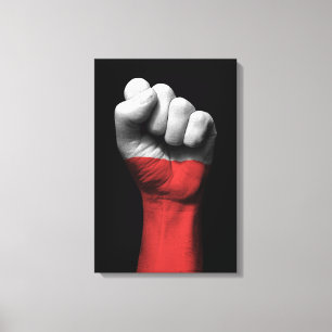 Angehobene geballte Faust mit polnischer Flagge Leinwanddruck