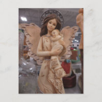 Angel Holding Säugling