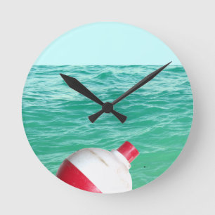 Angel im Wasser Runde Wanduhr