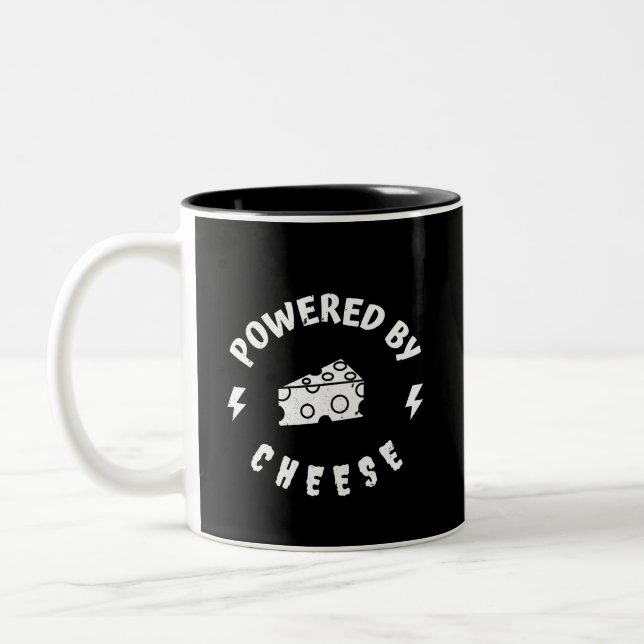 Angetrieben von Käse Zweifarbige Tasse (Links)