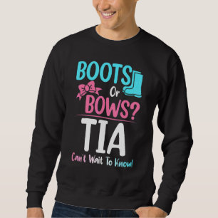 Ankündigung der Schwangerschaft bei Stiefeln oder Sweatshirt