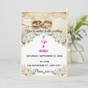 Anneaux de mariage traditionnels et invitation flo