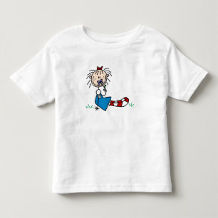 Annie, die im Gras mit Blumen-Shirt liegt Kleinkind T-shirt