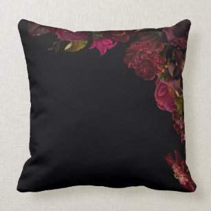 Antike nostalgische dunkle Rose und Blume auf schw Kissen