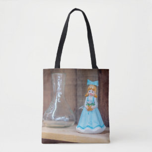 Antike Porzellanpuppe im blauen Kleid Tasche