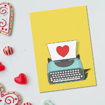 Antike Schreibmaschine mit rotem Herz zum Valentin