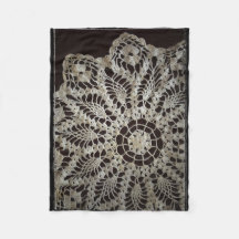 Antike schwarze und weiße Spitzen-Doily
