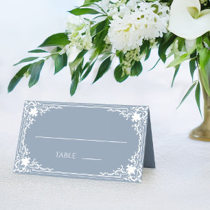 Antike staubblaue weiße Hochzeitsumrahmung im Vint Platzkarte